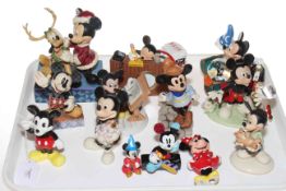 Various Mickey Mouse figures including Santa's Best Friend, Backyard Bubbles, Well Wishes, etc.