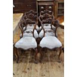 Set of six Victorian rosewood parlour chairs with serpentine front seats.