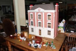 Georgian style three storey dolls house with furniture and dolls (87cm by 78cm by 40cm).