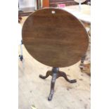 19th Century oak snap top supper table on tripod base, 72cm by 82cm diameter.