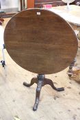 19th Century oak snap top supper table on tripod base, 72cm by 82cm diameter.