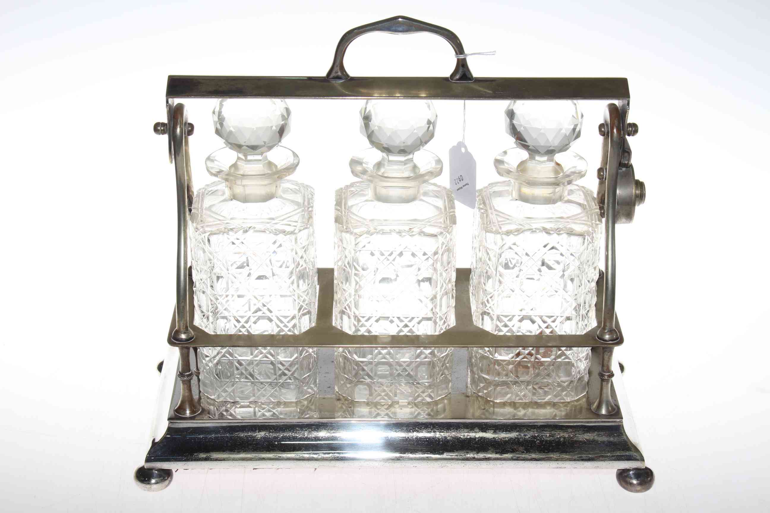 Silver plated three decanter tantalus (no key).