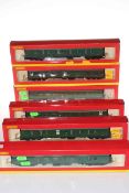 Collection of six Southern Region green railway carriages.