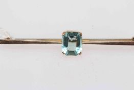 9 carat gold aquamarine colour bar brooch.
