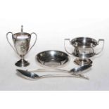 Two small silver trophy cups, small dish, and two Georgian dessert spoons (5).