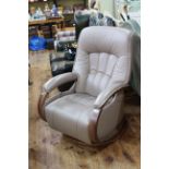 Himolla leather swivel reclining chair.