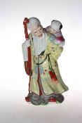 Chinese figure of elder with child, 31cm.