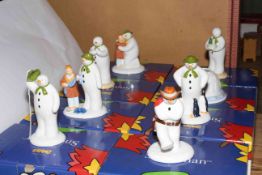 Eight Coalport The Snowman figurines with boxes.