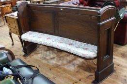 Victorian stained pine concave church pew, 180cm long.