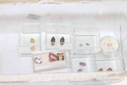 Collection of gemstones, including five tiny diamonds.