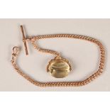 9 carat gold pocket watch chain with a citrine fob, total weight 45.7g.