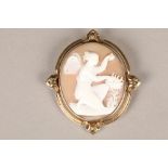 Large cameo brooch, set with a large carved conch shell with angel and doves on a yellow metal mount