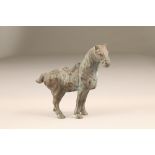 19th/20th century Chinese bronze horse, modelled on a Tang original. 13.5 cm high, 15 cm long.