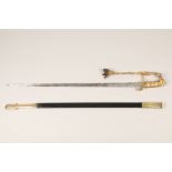 Modified officers sword and scabbard, lion head grip, and gold material pommel. Engraved blade and