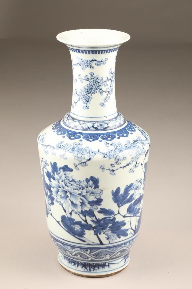 19th/20th century Chinese blue and white vase, decorated with flowering prunus and peonies. 44.5cm