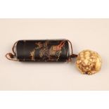 Japanese four case black lacquer inro, gilt decoration together with a carved ivory buddhist dog