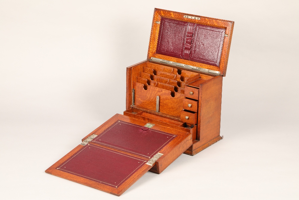 Edwardian light oak stationery and writing box, hinged cover revealing a fitted stationery