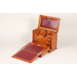 Edwardian light oak stationery and writing box, hinged cover revealing a fitted stationery