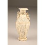 19th century Chinese Canton reticulated ivory twin handled vase (minor damages) 17.5cm high.