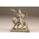 Bronze figure of a Buddhist deity, with eight arms astride a male lion, 14cm long, 17cm high.