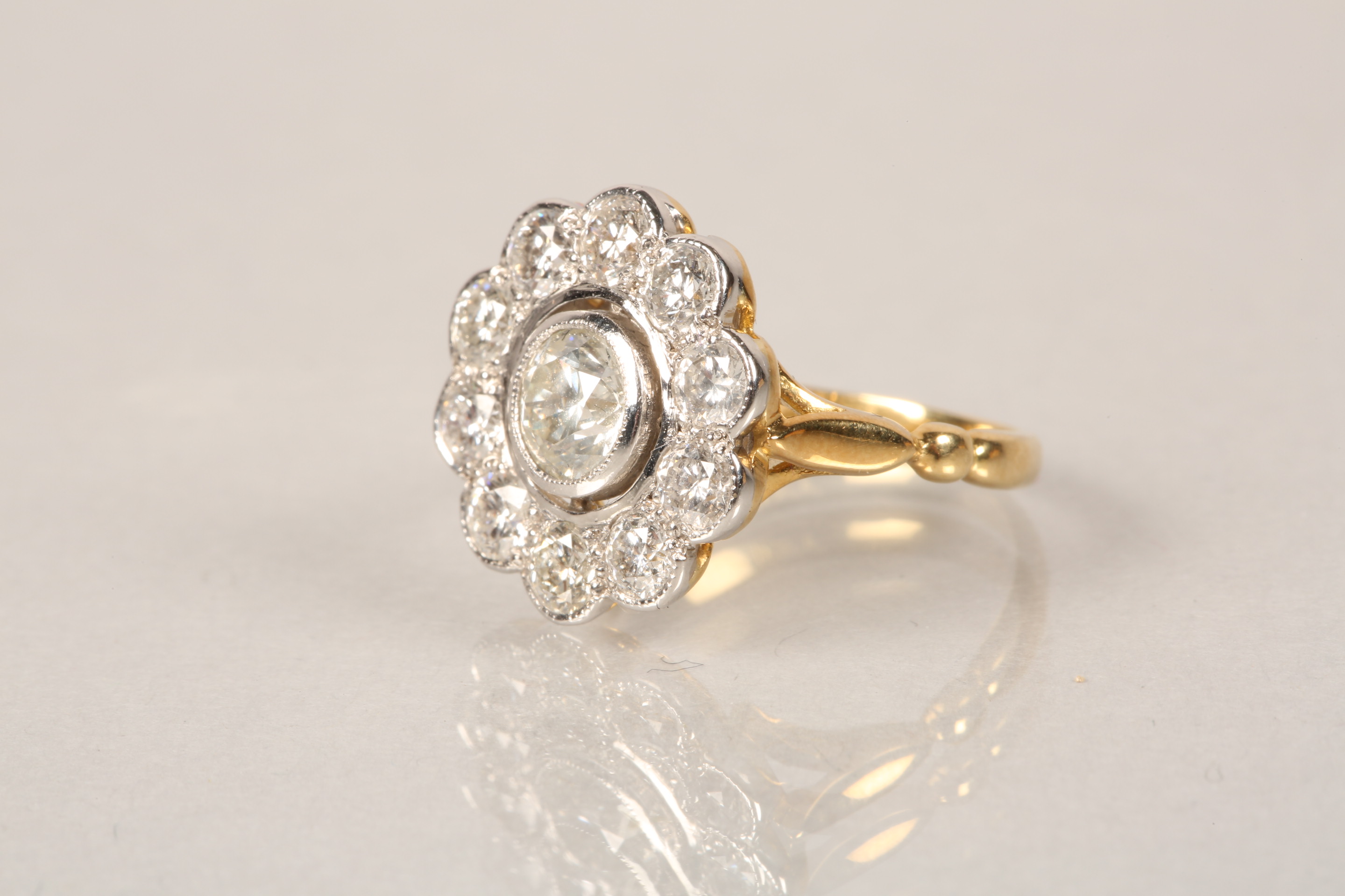 18 carat gold diamond cluster ring, daisy form, centre stone approx. 0.75 carat brilliant cut - Image 3 of 5