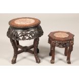 Chinese hardwood jardinière stand, rouge marble insert, carved and pierced prunus and bird apron,
