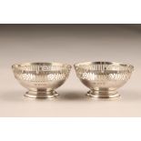 Pair of small circular pierced silver bon bon dishes, assay marked Birmingham 1938, 8.5cm