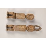 Pair of African fertility dolls, (i) 24cm (ii) 31cm.