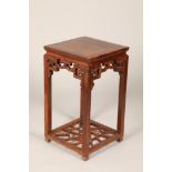 Chinese hardwood jardinière stand, square topped, on four legs united by cross stretchers, 77cm