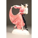 Large Katzutte porcelain Art Deco model, of a couple dancing on an oval base, green printed mark,