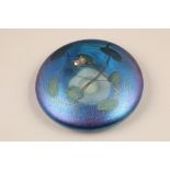 John Ditchfield for Glasform, a purple iridescent glass lily pad paperweight, mounted with a