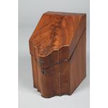 George III serpentine fronted mahogany knife box, hinged sloping lid. 22.5cm long, 29cm wide, 37cm