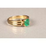 18 carat gold ring set with a single emerald, total weight 6.1g. Ring size N.