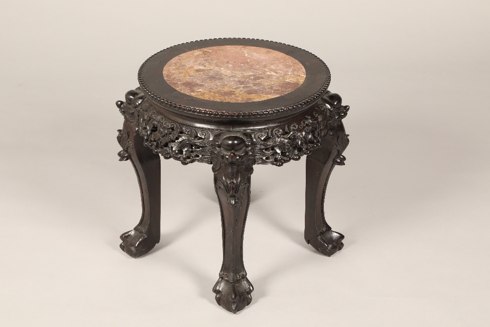 Chinese hardwood jardinière stand, circular top, rouge marble insert with beaded edge, carved and