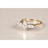 18 carat yellow gold three stone diamond ring, central 0.5 carat marquise cut diamond flanked on