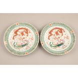 Pair 19th century Chinese famille verte plates, decorated with iron red dragons and phoenix, six