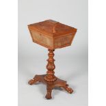 A William IV burr walnut tea-poy, hinged sarcophagus shaped top, raised on a carved central