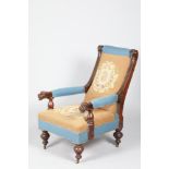 Victorian carved oak gentleman's open armchair, with lion mask elbows, 100cm high.