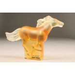 Modern Lalique amber glass horse, horse is designed in a galloping stance. Etched mark to base and