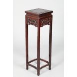 Chinese hardwood jardinière stand, square top, pierced and carved on four square legs united by