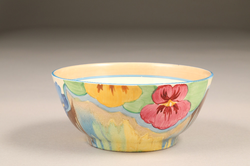 A Clarice Cliff Bizarre Delicia Pansies circular bowl, diameter 16.5cm, 7cm high.