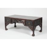 Pair Chinese hardwood low tables, pierced and carved frieze between two single fitted drawers,
