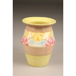 A Clarice Cliff hand painted vase, shape 342, hand painted with flowers, 19.5cm high.