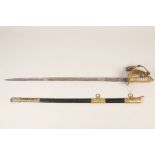 British naval officers dress sword, the blade is etched with crowned anchor amidst scrolls made by