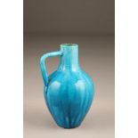 19th/20th century Chinese turquoise glazed ewer, 21cm high.