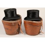 Black top hat by Battersby & Co London with a travel case plus another black top hat by Lock & Co,