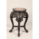 Chinese hardwood jardinière stand, rouge marble insert, carved and pierced floral and fruit apron