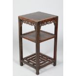 Chinese hardwood jardinière stand, square top, carved and pierced apron, four legs united by an