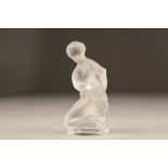 A Lalique frosted glass figure, of a nude female holding a goat, etched Lalique ( R ) France, 12