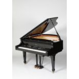 Roland KR117 digital intelligent grand piano, finished in black lacquer. The KR117 intelligent grand